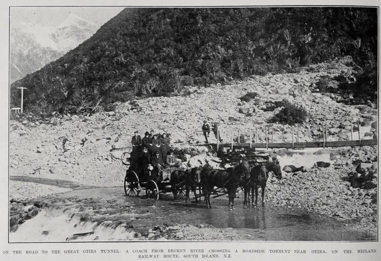 ON THE ROAD TO THE GREAT OTIRA TUNNEL: A COACH FROM BROKEN RIVER CROSSING A ROADSIDE TORRENT NEAR OTIRA, ON THE MIDLAND RAILWAY ROUTE, SOUTH ISLAND, N.Z.