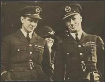Image: Portrait of Charles Ulm (left) and Charles Kingsford-Smith in RAAF uniform at their official welcome in Wellington, New Zealand, 1928