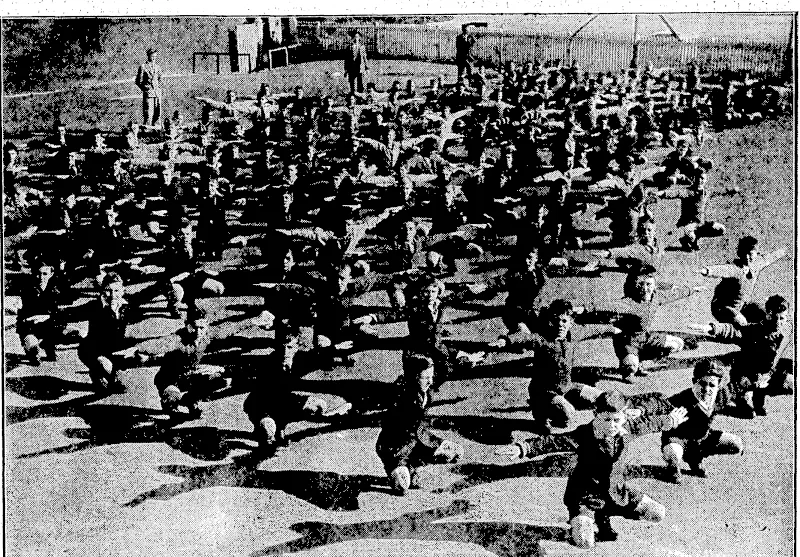 p '" " "Evening'J?ost". Photo.' MEDALS.EXHIBItED:Tp MEMBERS OF'THE/NEW ZEALAND NUMISMATIC: SOCIETY^)* [left; medal struch at-Darmstadt ion the occasion ofhhe^marriageioftheDuke of Edinburgh: withithe^Grarid Puchess'Marie>of Russia on'23rd January,}'lB74, .at^St. Petersburg. Centre,, bicentenary medalXof:'the Spalding Gentlemen's[Society, the, oldest .antiquarian societyin. the world, of which Sir Isaac' Newton, wasa member. Right, medal struck on the passing of the Reform Bill in 1832. •';'..'.','[ .'■ ■•*->' • ■- . • ■li\uumi! J'osr ,I'nutu PHYSICAL "JERKS" IN A SCHOOL PLAYGROUND.—Boys of Clyde Quay Primary School undergoing physical training under thedirection of the teaching staff. These exercises arc part of the-curriculum in.all New Zealand schools. (Evening Post, 22 July 1931)
