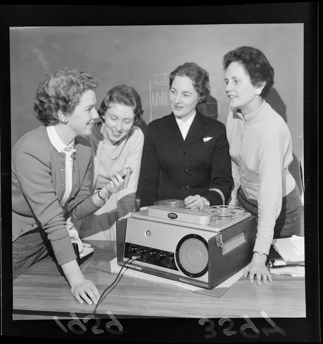 Group of unidentified NAC (New Zealand National Airways Corporation) air hostesses in training, with Simon reel to reel player.