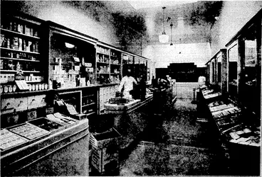 Image: THE MADDOX PHARMACY: WELLINGTON'S LATEST MODERN CHEMIST SHOP.—Situated. at Lambton Quay, near Bowen Street, -the Maddox Pharmacy (late Staples' Pharmacy) has been designed on the lines of oversea drug stores, with special attention paid to the open dispensary.- Qualified assistants use only the purest of drugs, yet prescriptions remain at a minimum. A comprehensive range of all Chemists' Goods arc procurable—low prices and good quality have both been considered in this departure from old Pharmacy conditions.—P.B.A, (Evening Post, 16 September 1939)