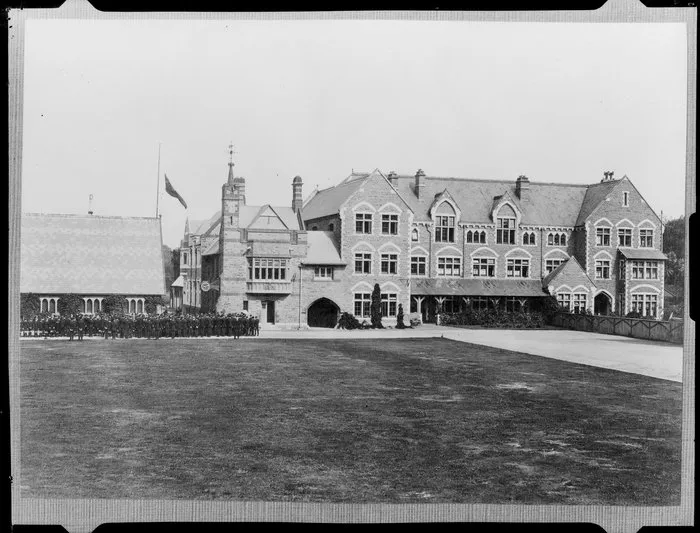 Christ's College buildings on west side of quadrangle, including large group of students standing outside School House