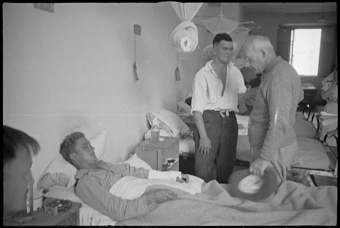 Prime Minister Peter Fraser chatting with patients at 2 New Zealand General Hospital, Caserta, Italy, World War II - Photograph taken by George Kaye