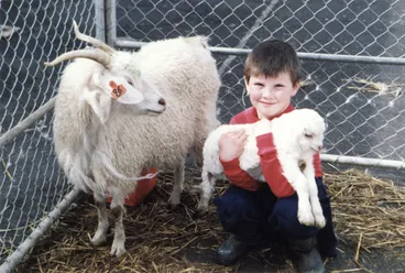 Image: Wallaceville Research Centre; open day; Todd Ward, nanny goat and kid.