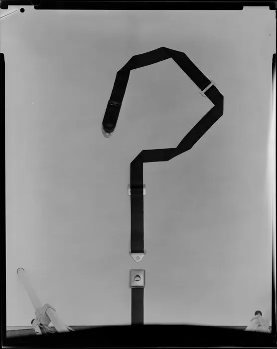 Safety belt laid out in question mark shape