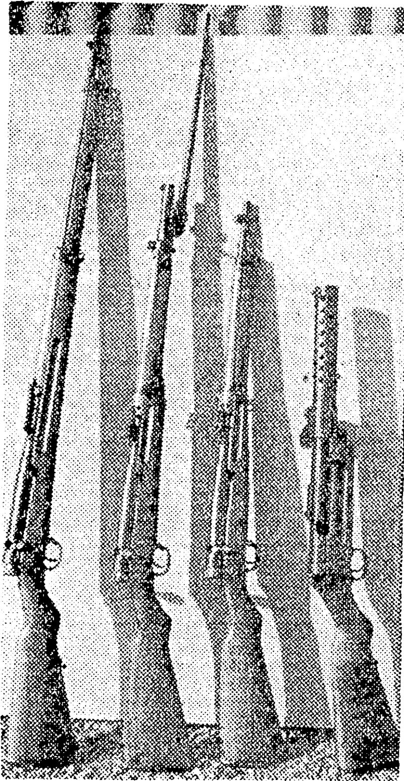 A Japanese infantry rifle, two carbines (one ivith folding bayonet), and the Japanese equivalent of our tommy-gun. (Evening Post, 15 May 1943)