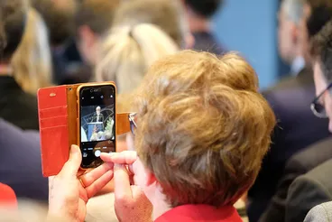 Carolyn Robertson captured on a phone during her speech, opening ceremony, TSB Space / Tautoru Image: Carolyn Robertson captured on a phone during her speech, opening ceremony, TSB Space / Tautoru