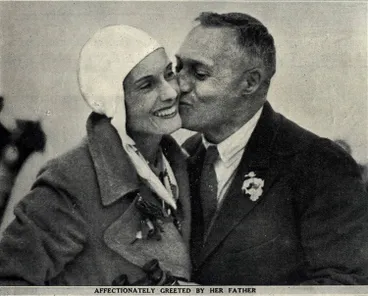 Image: Affectionately greeted by her father
