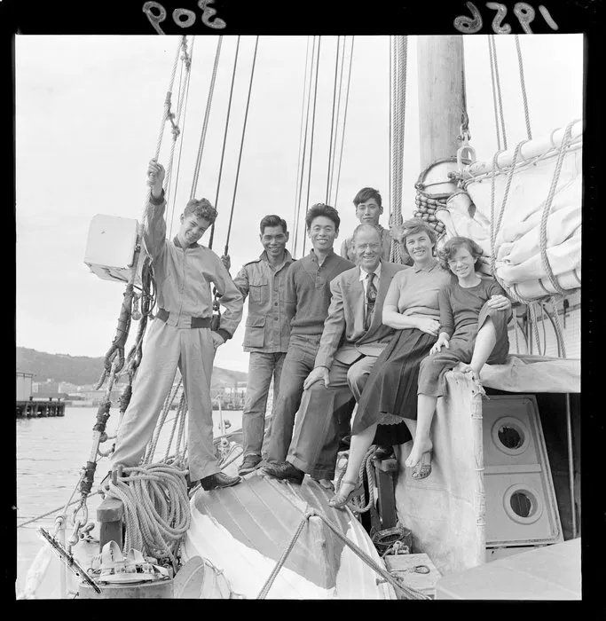 The Reynolds family with three Japanese boys on board the yacht Phoenix