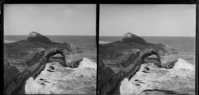 Rock arch and waves at Tunnel Beach, Otago Region