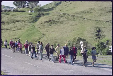 Image: Marchers walking on a road