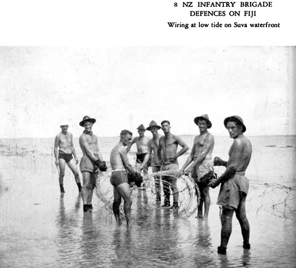 8 NZ Infantry Brigade defences on Fiji. Wiring at lowtide on Suva waterfront
