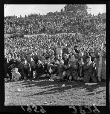 Image: Schoolboys cheering victory of the All-Blacks Rugby Union football team, at second test match, New Zealand vs British Isles, at Athletic Park, Berhampore, Wellington