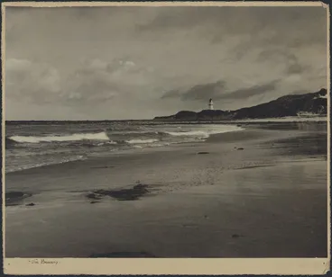 Image: Beach and headland with lighthouse