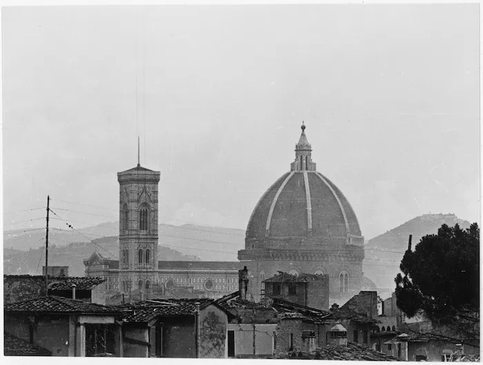 Dome of Palazzo Vecchio and Giotto's Campanile partly obscured by smoke during World War II, Florence