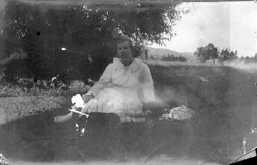 Mary Laurenson sitting outside : digital photograph