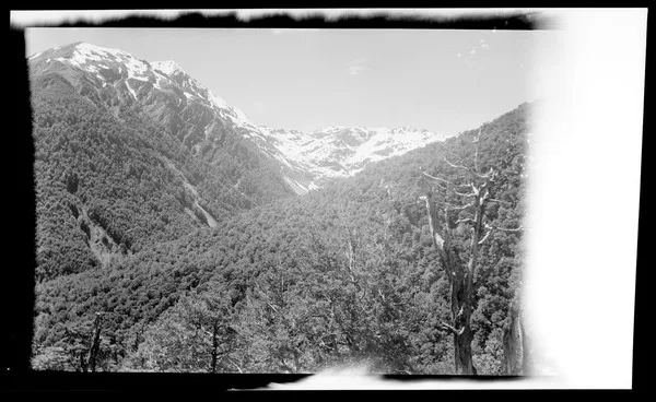 Snow on hills in Lewis Pass