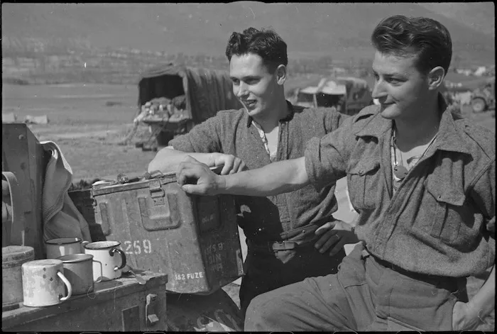 M G Jensen and L W Adams, NZ Infantry, resting behind the line after fighting in Cassino, Italy, World War II - Photograph taken by George Kaye
