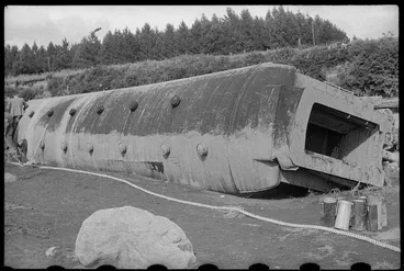 Image: Railway carriage on the bank of the Whangaehu Stream at the scene of the railway disaster at Tangiwai