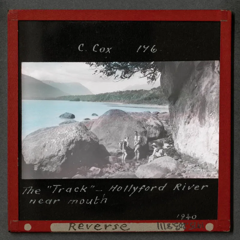 Lantern Slide: Three trampers amongst boulders