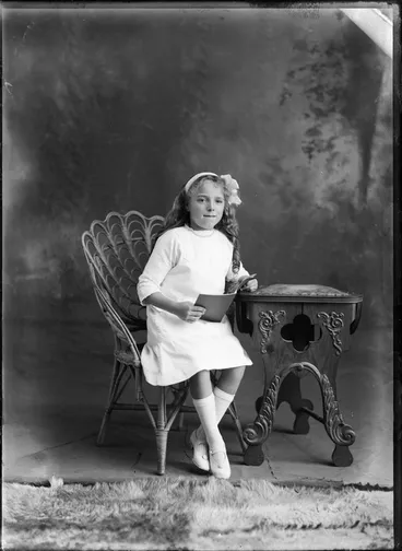 Image: Studio portrait of unidentified girl holding a book, probably Christchurch