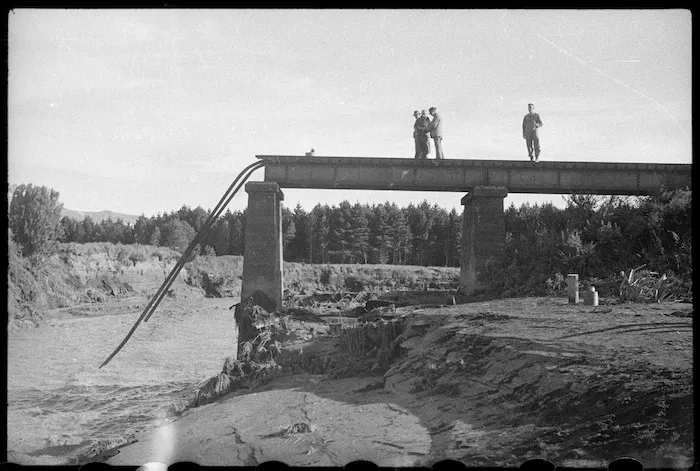 Remains of the railway bridge with broken track attached, at the scene of the disaster at Tangiwai