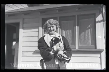 Image: Woman holding puppy