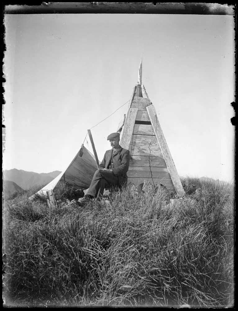 Ernest Lancaster at camp by Mt Dundas trig