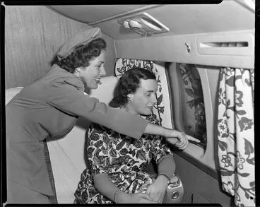 Image: Miss Gwen Robyns and air hostess Judith Marchant on the DC6 RMA Adventurer, British Commonwealth Pacific Airlines