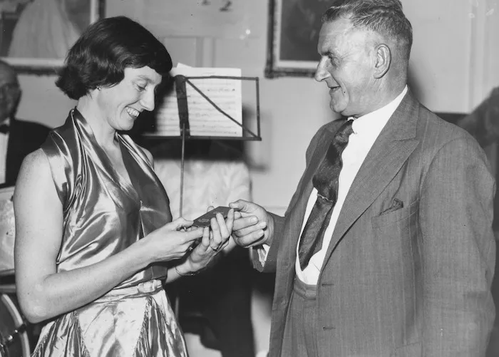 Yvette Corlett (nee Williams) receiving plaque