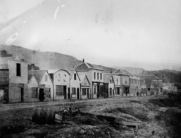 Image: Wooden shops on Lambton Quay, opposite coastline