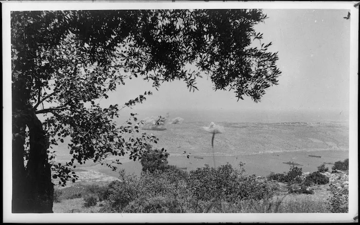 Bombs bursting among gun emplacements in Suda Bay, Crete