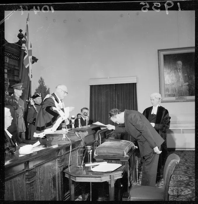 Miroslav Josef Smutny submitting his naturalisation certificate at the first public naturalisation ceremony in New Zealand