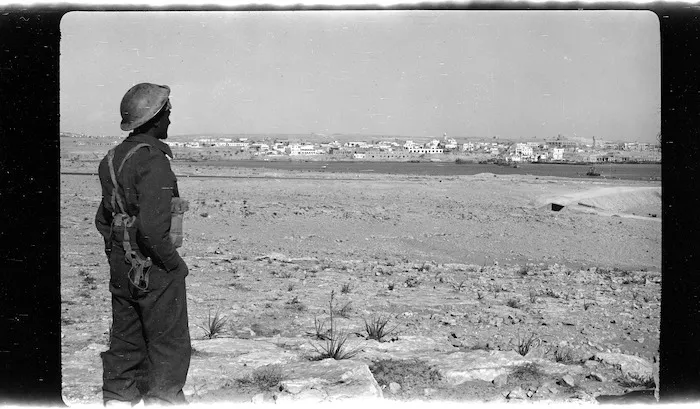 New Zealand soldier looking across to Tobruk, Libya, during World War II