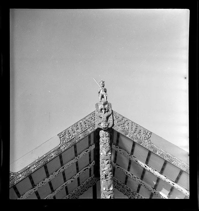 View of carved panels and figures on the front of the Tamatekapua meeting house, Ohinemutu, Rotorua, Bay of Plenty