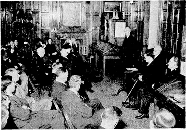 Image: To mark the jubilee of the opening to the.public of the Turnbull Library, Bowen Street, Wellington, a gathering took place on Thursday afternoon in the Library. Amongst the speakers ivas the Minister of Education, Mr. H: G.R. Mason, seen standing on the right. (Evening Post, 07 July 1945)