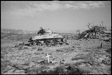 Image: Burnt out New Zealand Sherman tank near Orsogna, Italy, World War II - Photograph taken by George Kaye