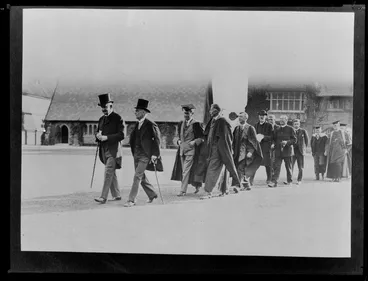 Image: Schoolmasters and unidentified members of the clergy, walking in the grounds of Christ's College, Christchurch