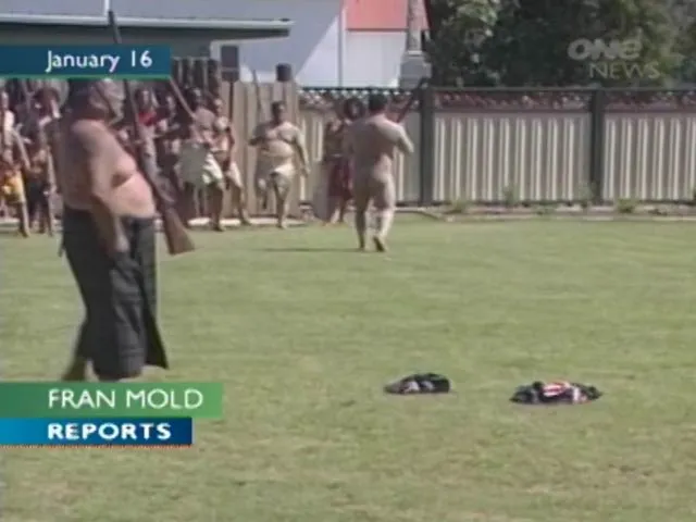 Tame Iti shooting a flag, 2005