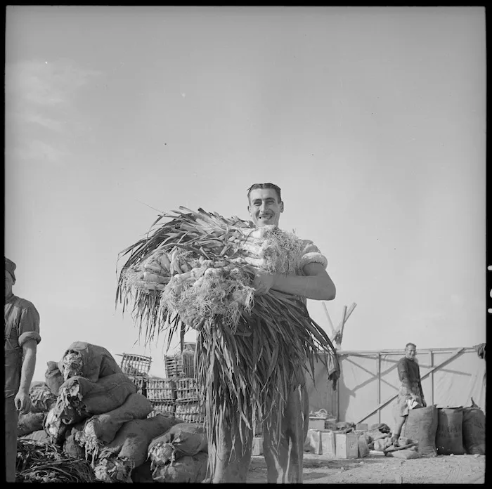 Member of NZASC with leeks fresh from Egyptian gardens