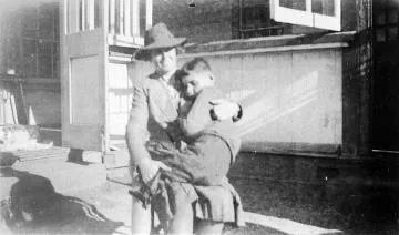 Marjorie McGregor holding Alex Ryan