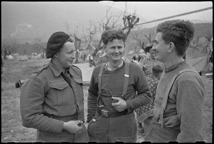 NZ Infantry soldiers rest immediately behind the lines after heavy fighting in Cassino, Italy, World War II - Photograph taken by George Kaye