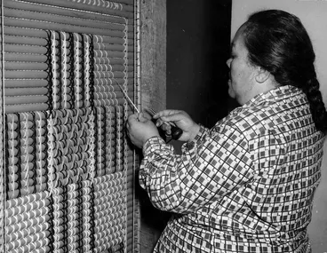 Image: Mrs H Owen working on a tukutuku panel