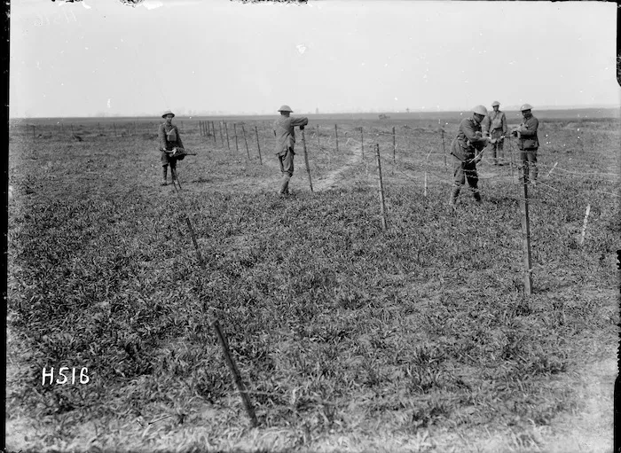 Maori Pioneers making a barbed wire entanglement, France