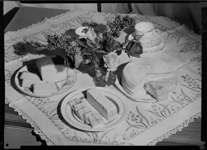 Cake layout with roses on table