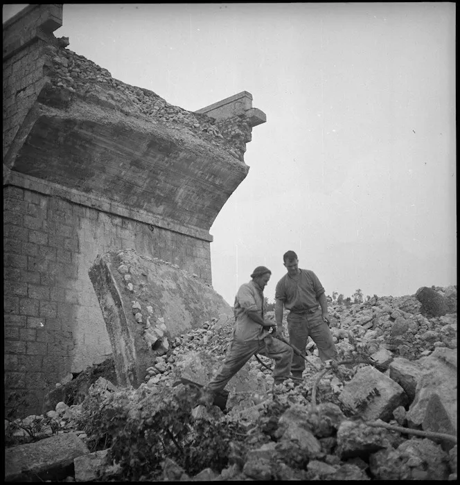 Engineers working on the ruins of bridge demolished by Germans in Italy, World War II - Photograph taken by George Kaye