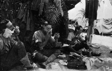 Image: World War 1 soldiers Charley Fitton, Bunkall and A F Buckland of 11th Squadron, Auckland Mounted Rifles, shaving under palms at Bir-Et-Maler, Palestine