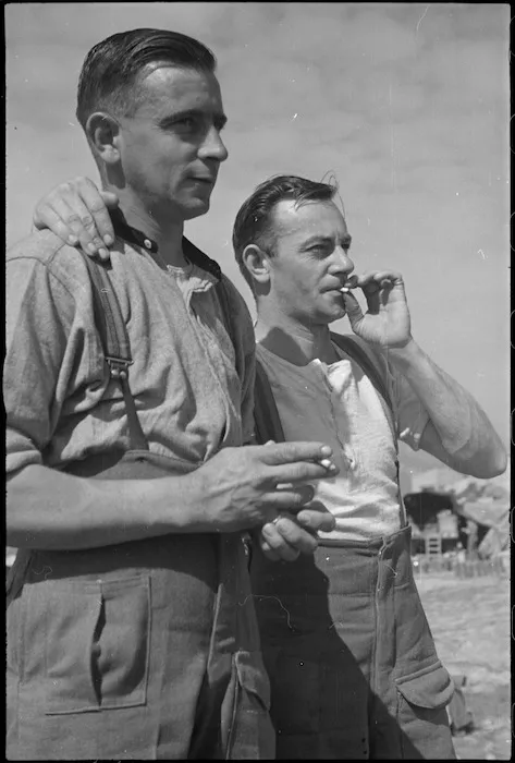 W D R Shaw and L E Beilby, NZ Infantry, resting behind the line after the fighting in Cassino, Italy, World War II - Photograph taken by George Kaye
