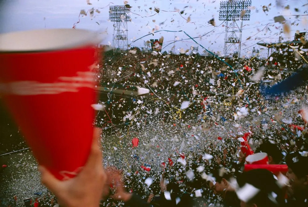 Fans celebrate the victory of Keio University over Waseda University in the World Series of Japanese baseball, Tokyo. Taken for a series on Japan for ‘Life’