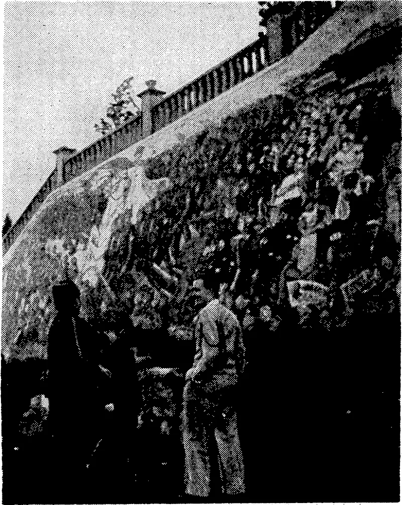 Evening Post" Photo, Scenes on the Taekakariki Bowling Club's, green on Saturday, when the touring Queensland team was entertained by Sir Charles Norwood, the club's patron, and members of the club. Top, watching Maori.-gifls from Otaki giving.a canoe poi. Right, Mr. F. C. Ker (right) and another Queenslander. in Maori costume. Left, Sir Charles Norwood signalling the score in his match with the Queenslander Mr. V. Day. .. In -order, to spur the: Chinese people on against the Japanese, General Chiang Kai-shek has had the wall of the famous Ko Kahi Ro ("Yellow Stork Tower"), at1 Wuchang, painted with a> large >picture showing him, on a white horse,, leading the Chinese armiesito victory. (Evening Post, 30 January 1939)